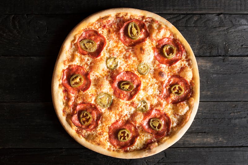 Spicy Diavola pizza with salami and chili flakes