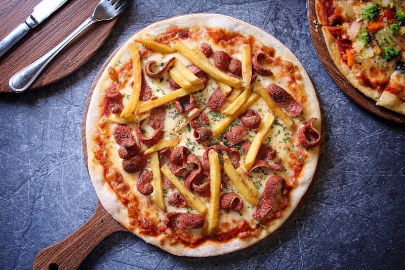 Meat lovers pizza with sausage and bacon